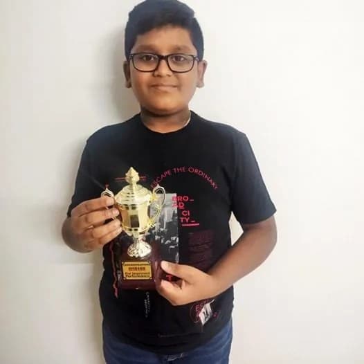 Rishabh Vinay with cup