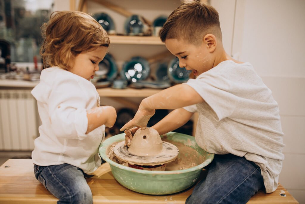 Brothers at a pottery class together