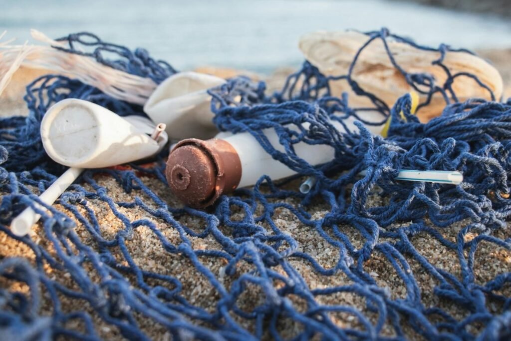 Image of plastic material caught stuck in fishing net from ocean